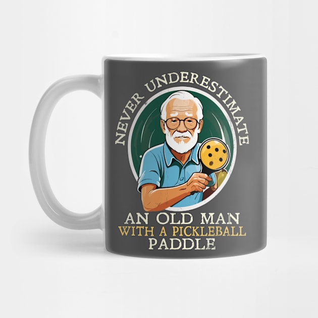 Never Underestimate and Old Man with a Pickleball Paddle by Blended Designs